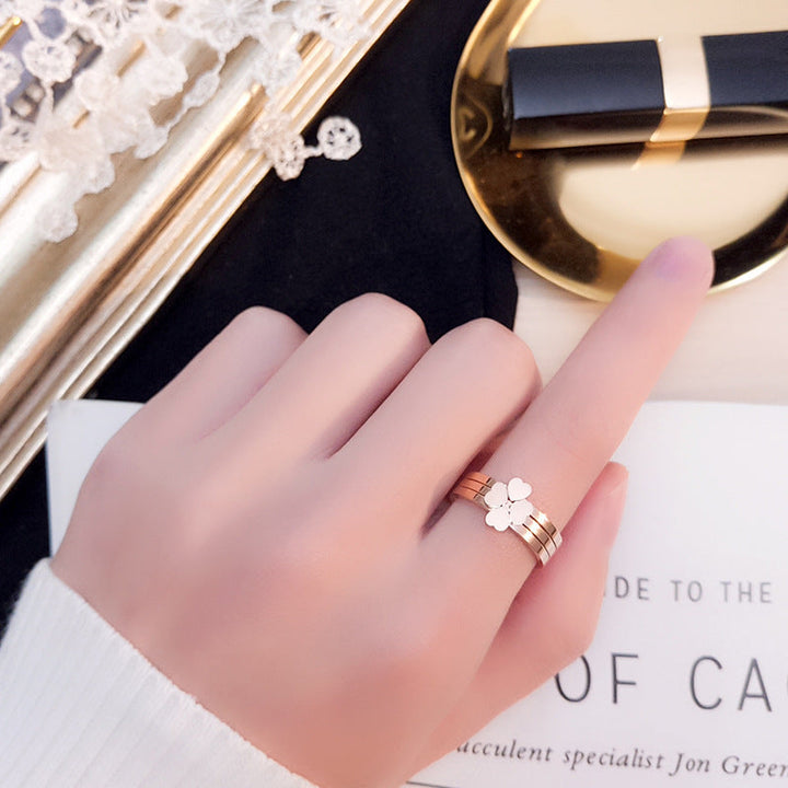Women's ring with playful heart design and elegant multi-band Nin Boutique