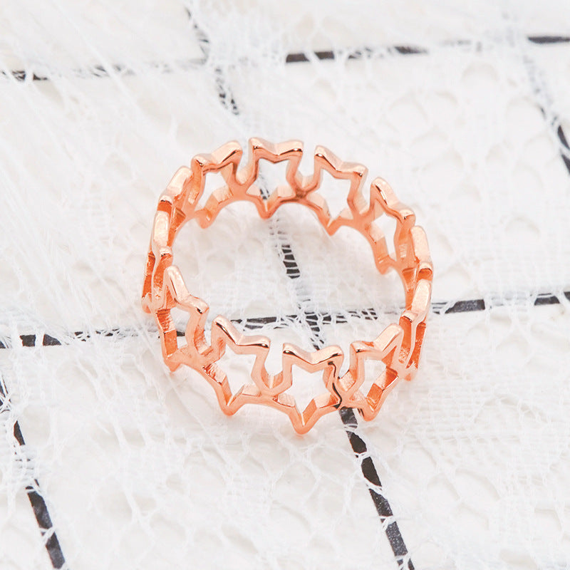Ladies Ring with sparkling star pendants Nin Boutique