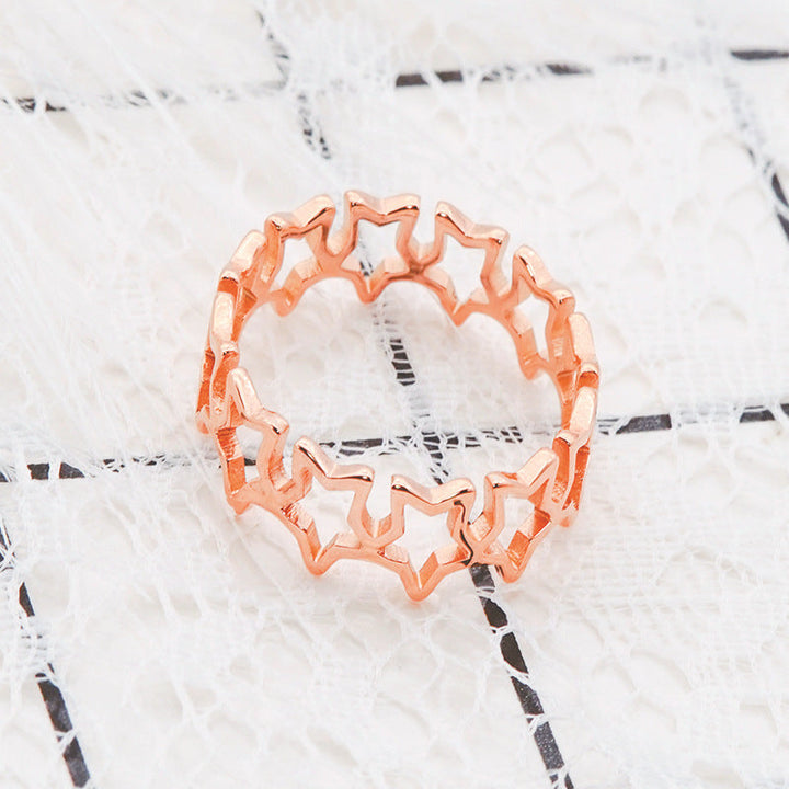 Ladies Ring with sparkling star pendants Nin Boutique