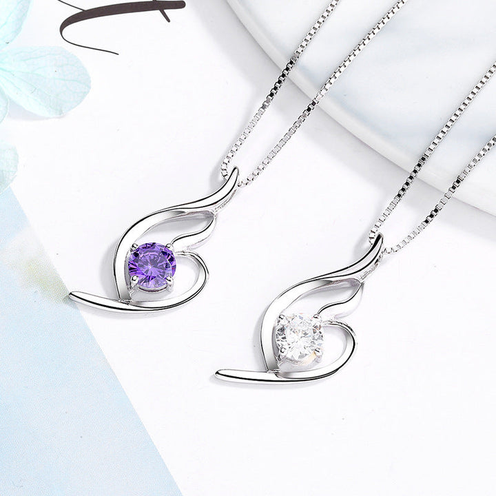 Women's necklace with elegant spiral motif and sparkling purple stone Nin Boutique
