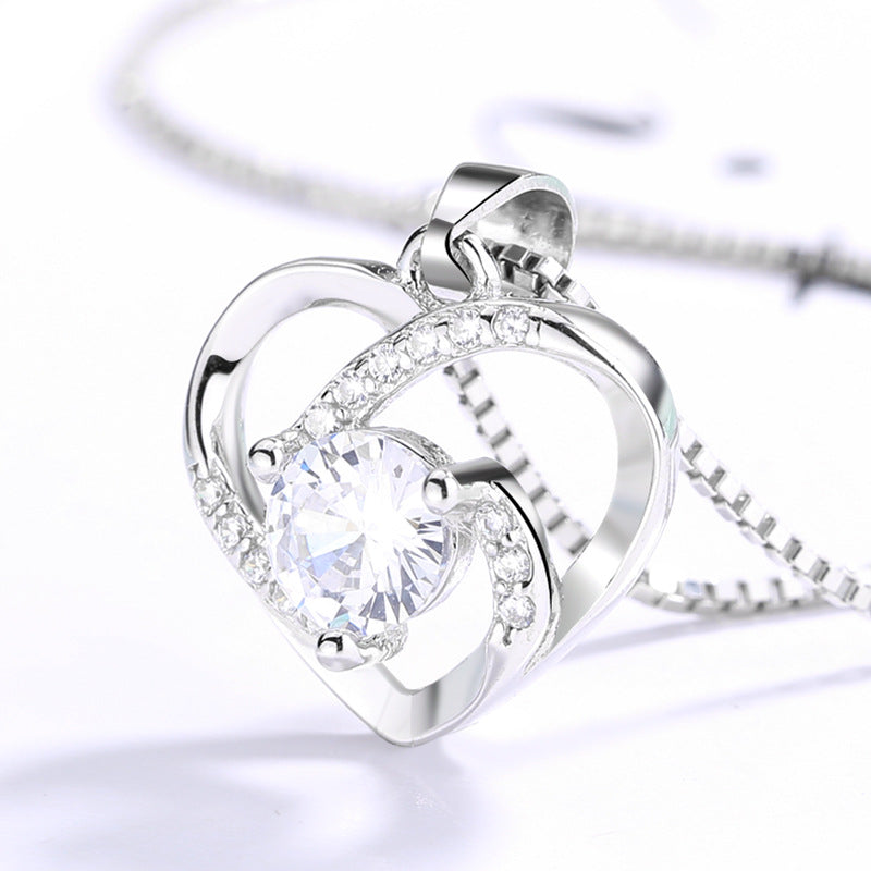 Women's necklace with heart-shaped pendant and sparkling zirconia Nin Boutique