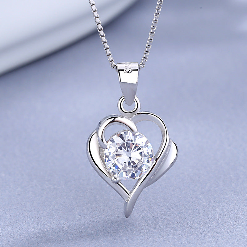 Women's necklace with sparkling heart pendant and elegant silver clasp Nin Boutique