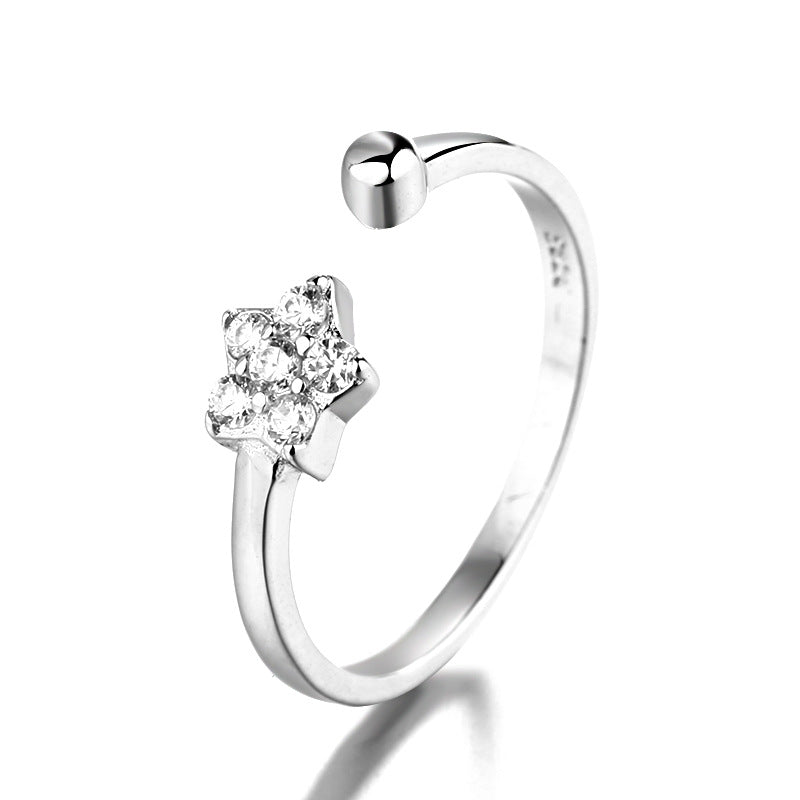 Women's ring with sparkling star pendant and elegant, open design Nin Boutique
