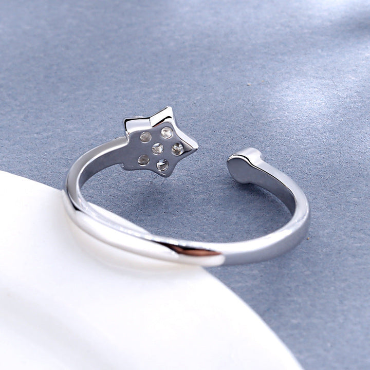Women's ring with sparkling star pendant and elegant, open design Nin Boutique