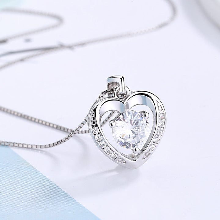 Women's pendant necklace with sparkling violet stone and elegant heart design Nin Boutique