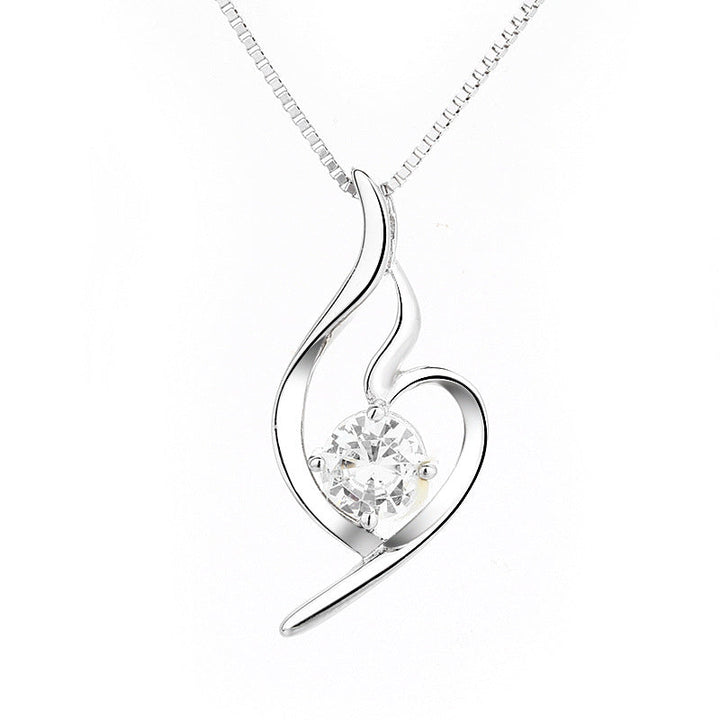 Women's necklace with elegant spiral motif and sparkling purple stone Nin Boutique