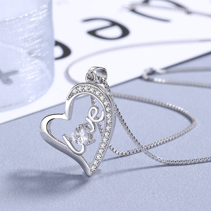 Women's necklace with stylish heart pendant and sparkling zirconia stones Nin Boutique