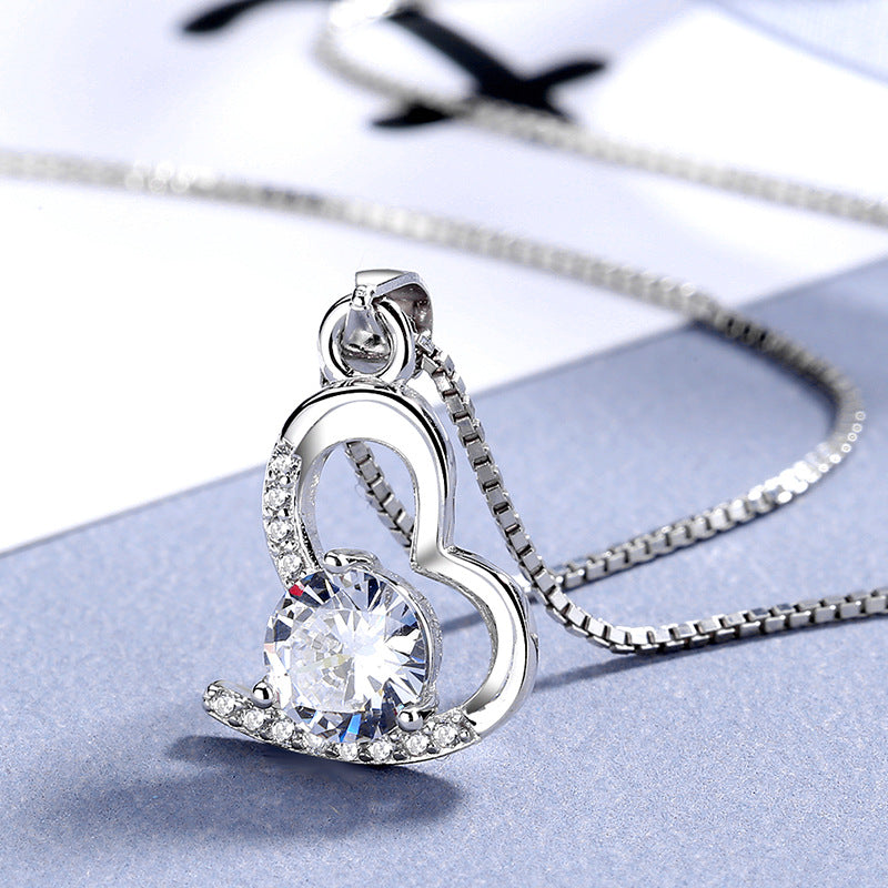 Women's necklace with unique heart-shaped pendant and shining gemstone Nin Boutique