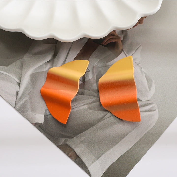 Women’s earrings in modern wave design Nin Boutique