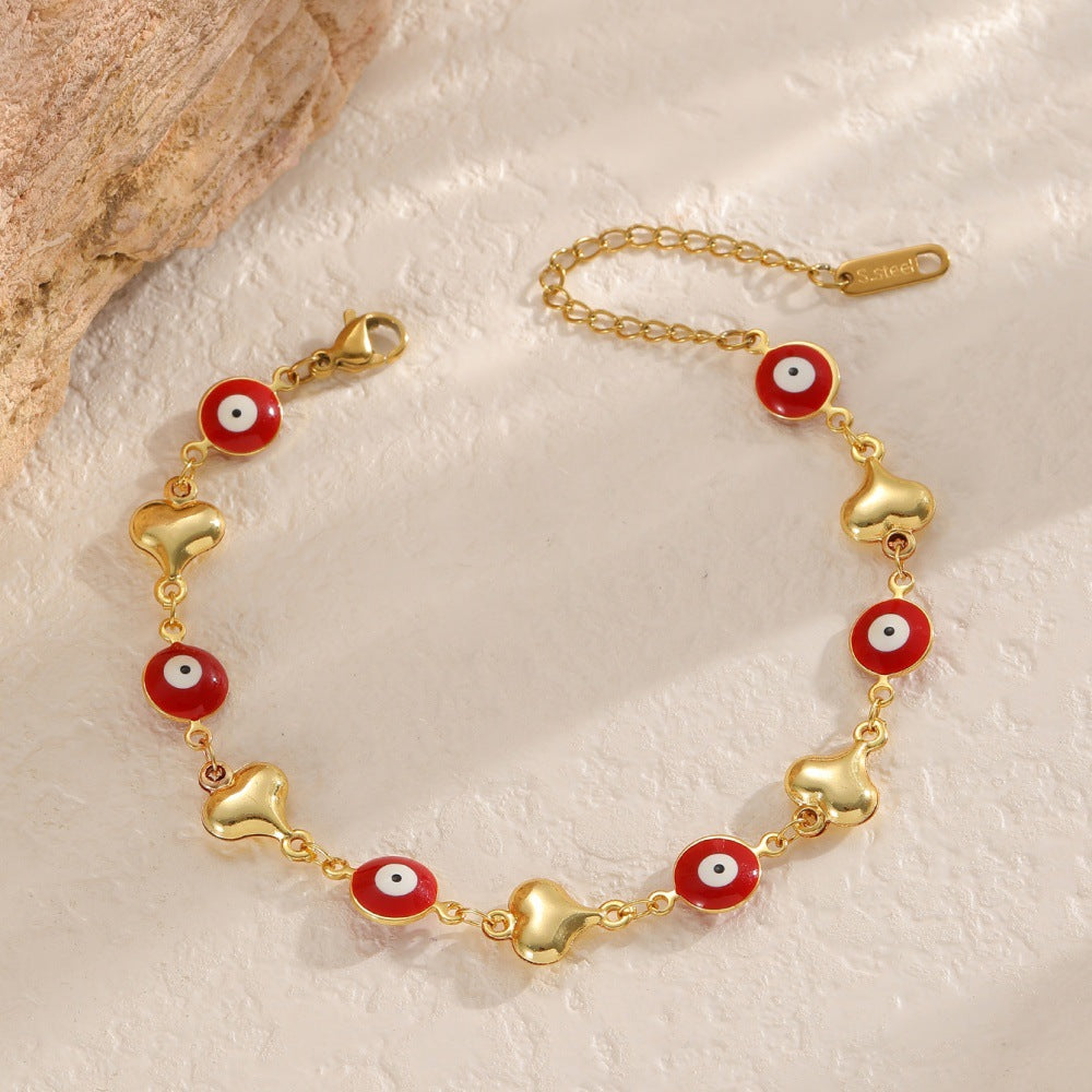 Ladies bracelet with elaborate pendants Nin Boutique