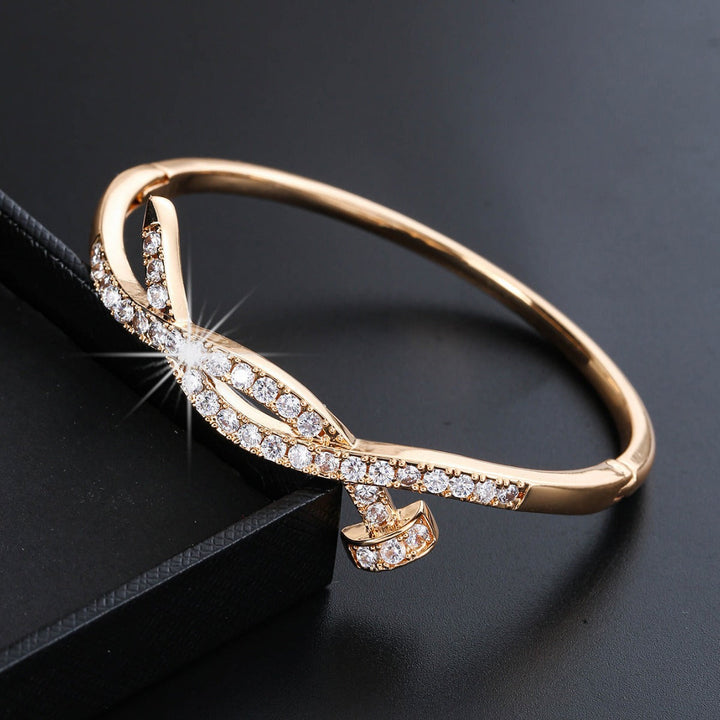 Women's bangle with artistic infinity symbol and sparkling zirconia Nin Boutique