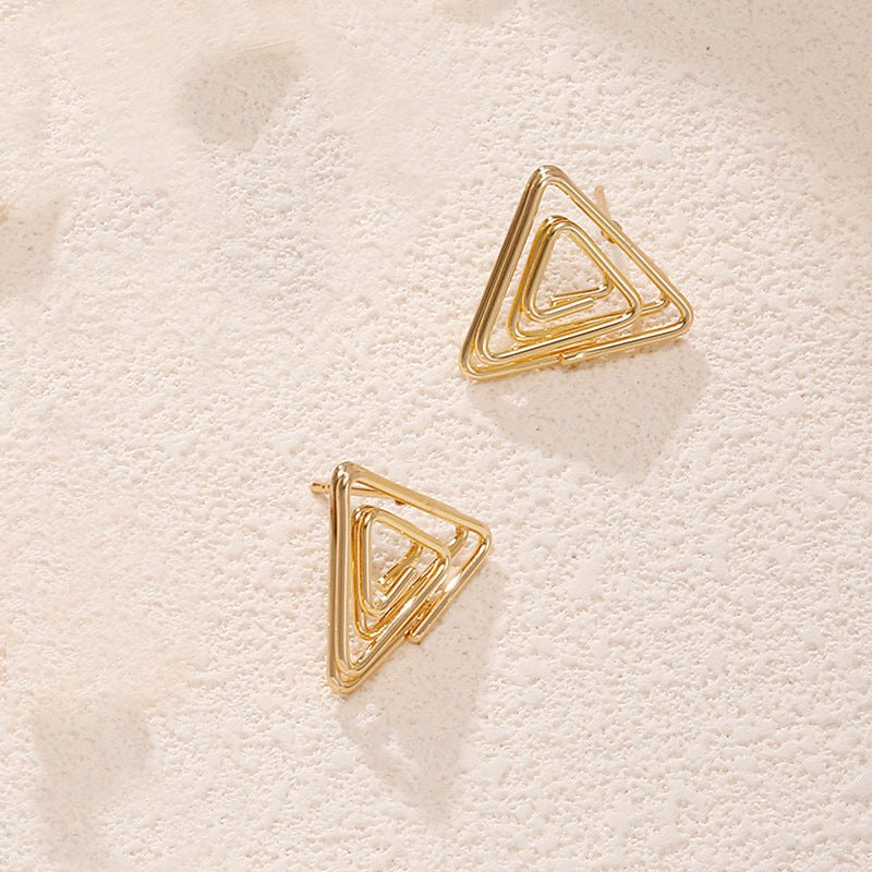 Ladies earrings in artistic face design Nin Boutique