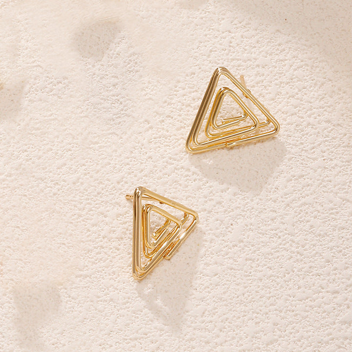 Ladies earrings in artistic face design Nin Boutique