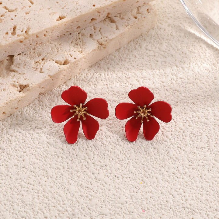 Ladies earrings in artistic floral style with pearl accent Nin Boutique