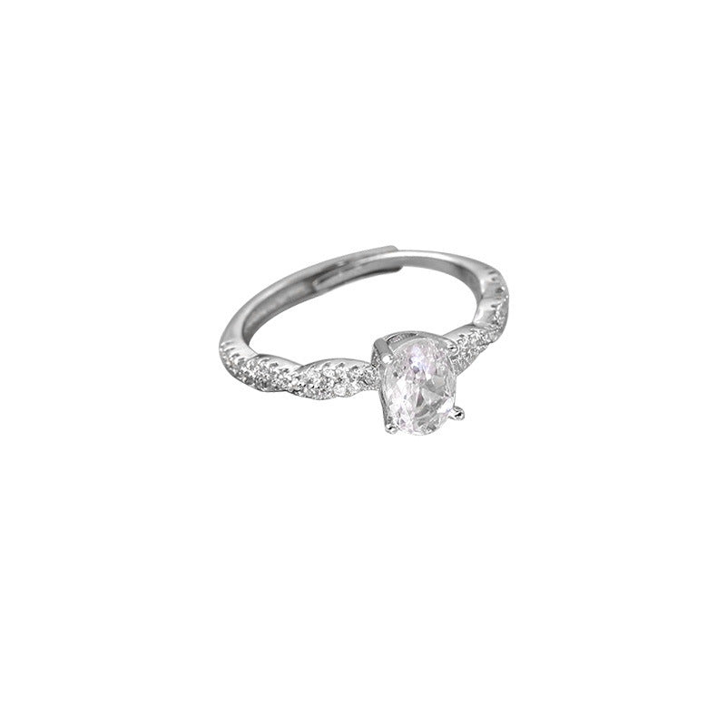 Ladies ring with sparkling zirconia and timeless wave pattern Nin Boutique
