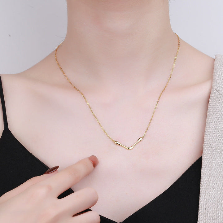 Women's necklace with modern, curved pendant Nin Boutique