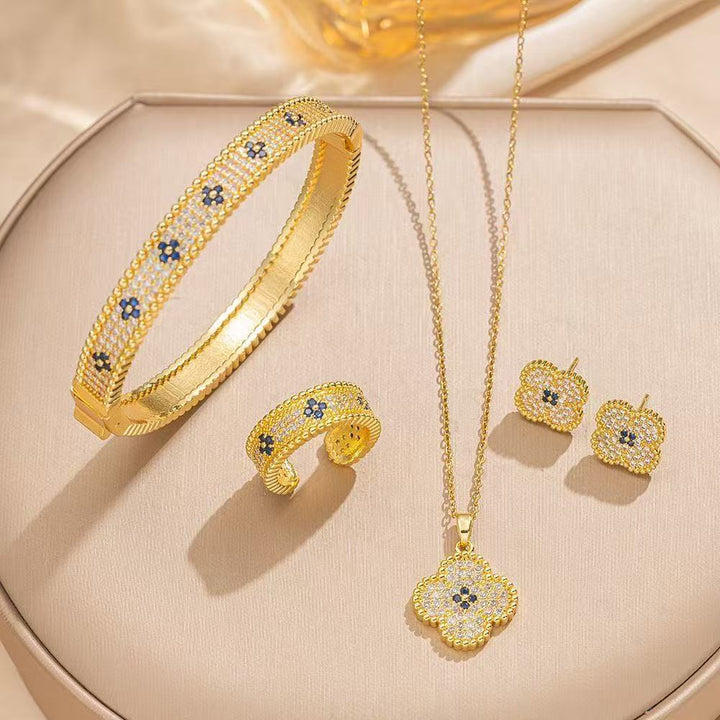 Women's intricate quatrefoil pave cubic zirconia pendant necklace with sapphire accent Nin Boutique