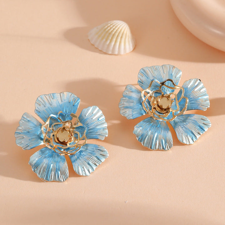 Ladies stud earrings in an artistic flower design Nin Boutique