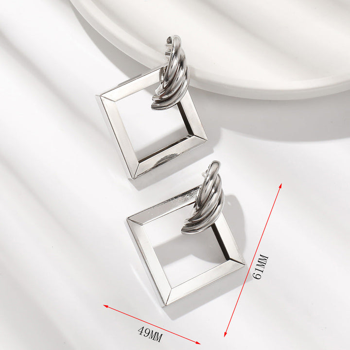 Ladies' earrings in contemporary square ring design Nin Boutique