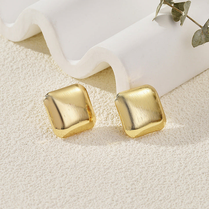 Women's earrings with elaborate scale pattern Nin Boutique