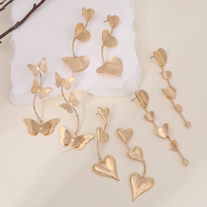 Ladies earrings with intricate butterfly design Nin Boutique