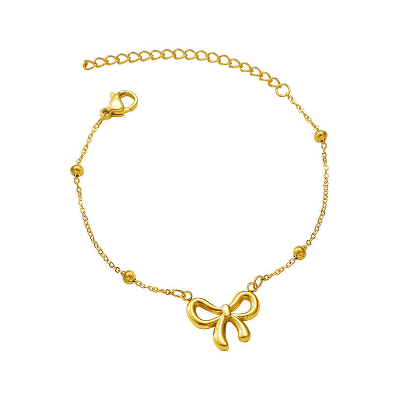 Women's ankle bracelet with delicate bow design and elegant chain layout Nin Boutique