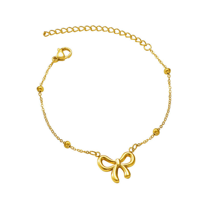 Women's ankle bracelet with delicate bow design and elegant chain layout Nin Boutique