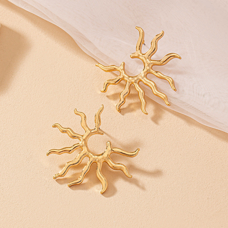 Women's earrings in stylish sun design Nin Boutique
