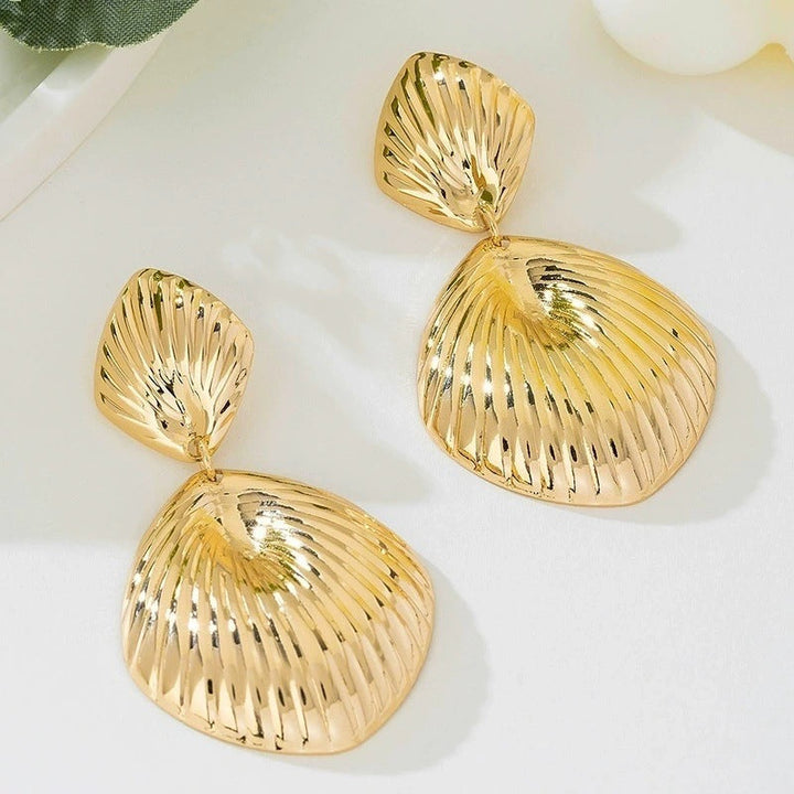 Ladies earrings in artistic sunbeam design Nin Boutique