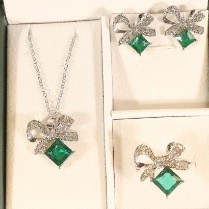Women's vintage bow cocktail ring with square-cut gemstone simulant and pavé crystal accents Nin Boutique