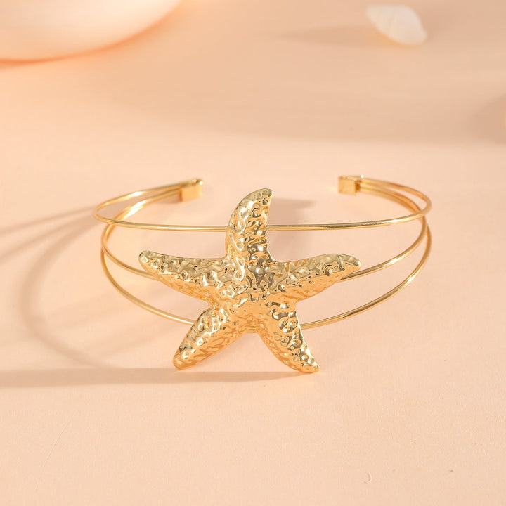 Women's bangle with elaborate bow design Nin Boutique