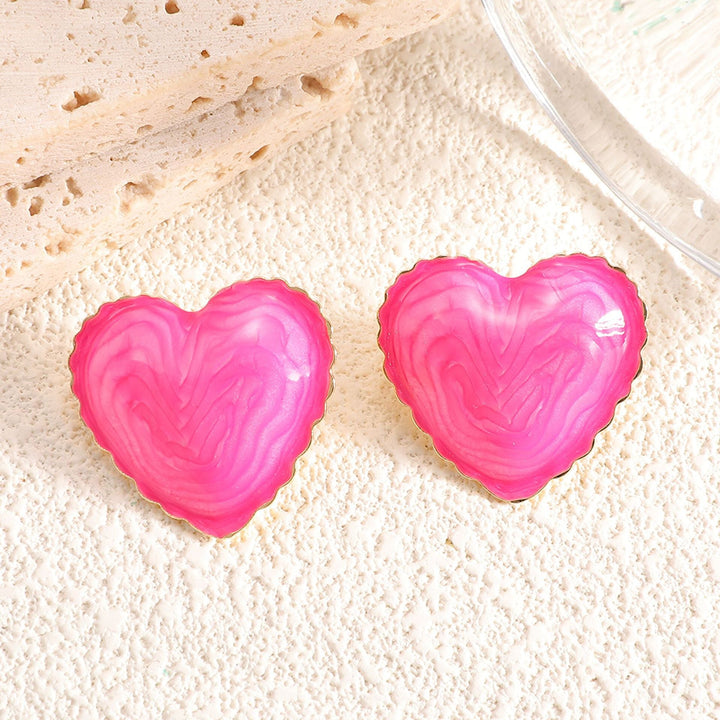 Women’s stud earrings with intricate heart design made of high-quality epoxy resin Nin Boutique