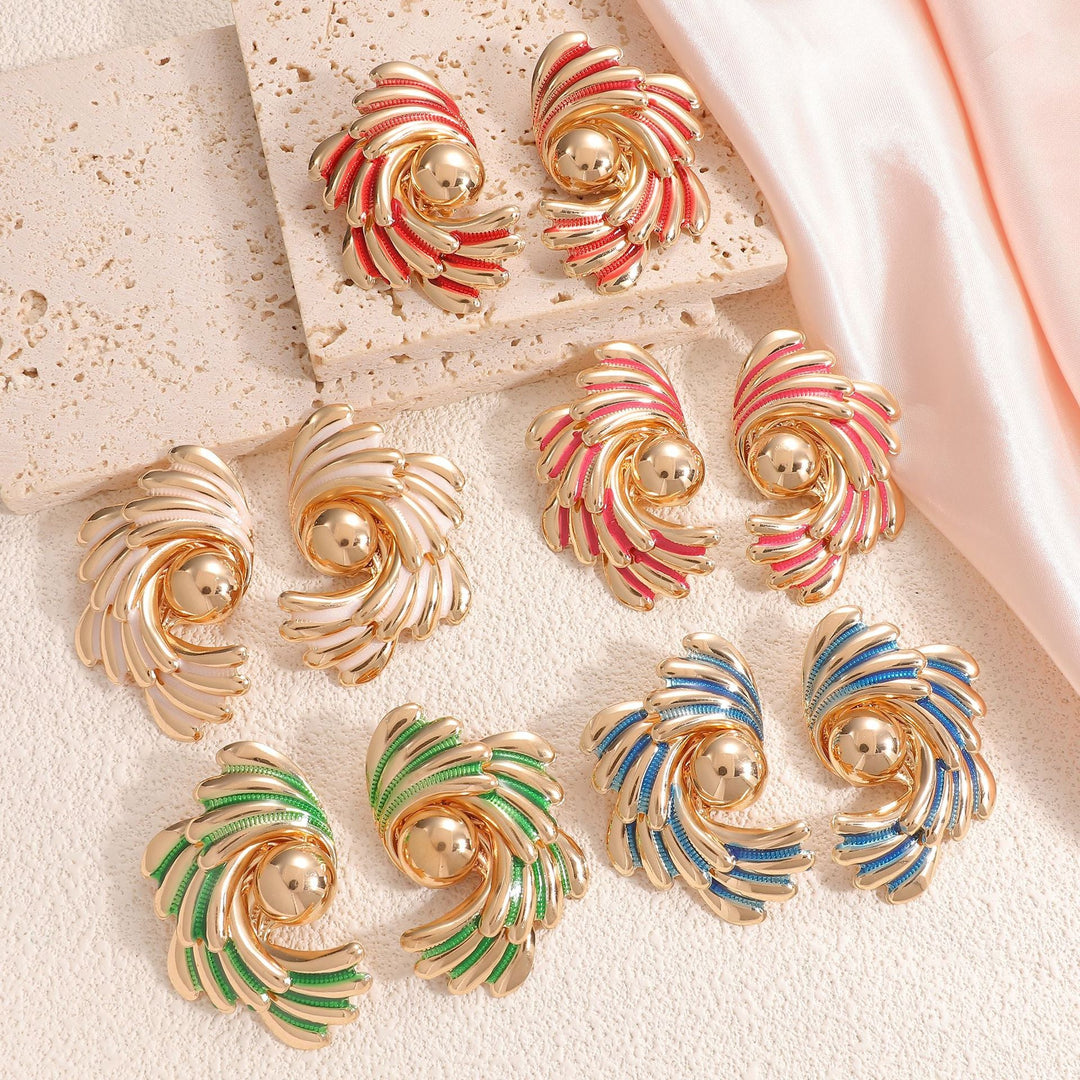 Ladies earrings with ornate wave pattern Nin Boutique