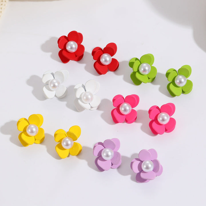 Ladies earrings in vibrant floral design with pearl accent Nin Boutique