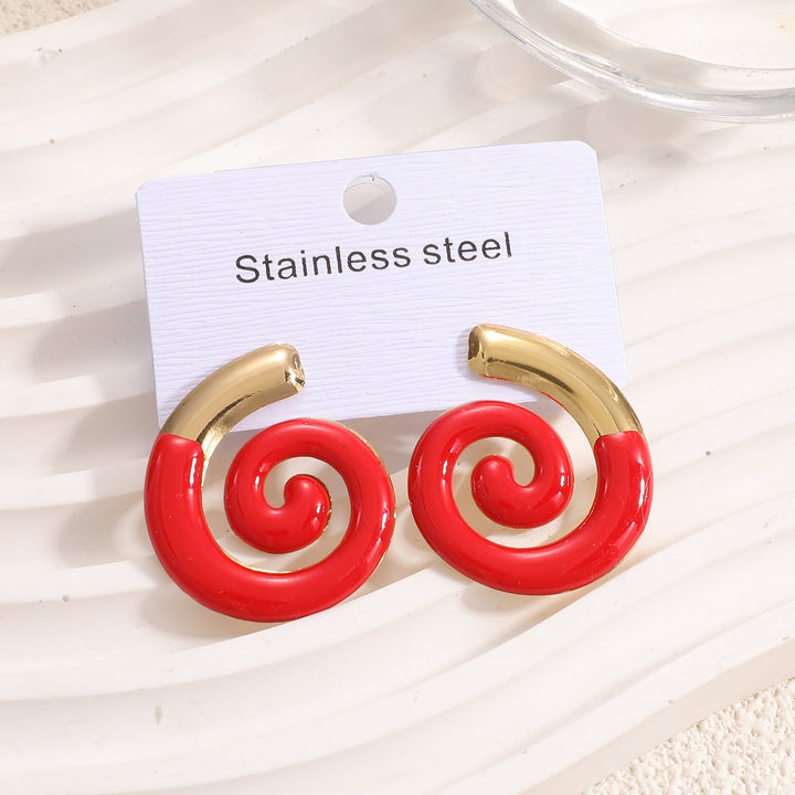Ladies earrings in artistic sun motif Nin Boutique