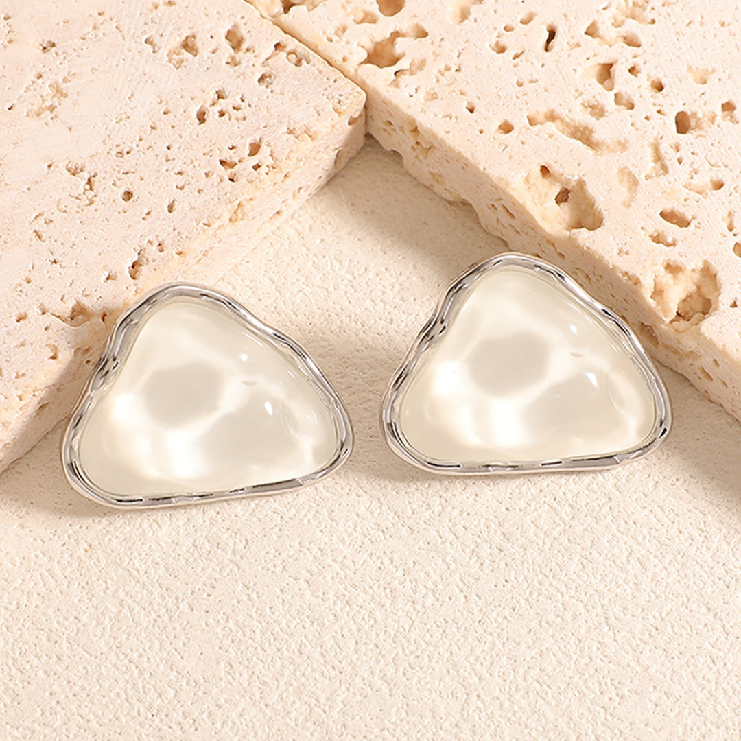 Women's stud earrings with intricate heart design Nin Boutique