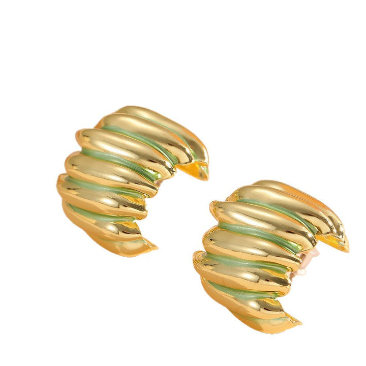 Ladies' jewelry earrings in elegant wave pattern Nin Boutique