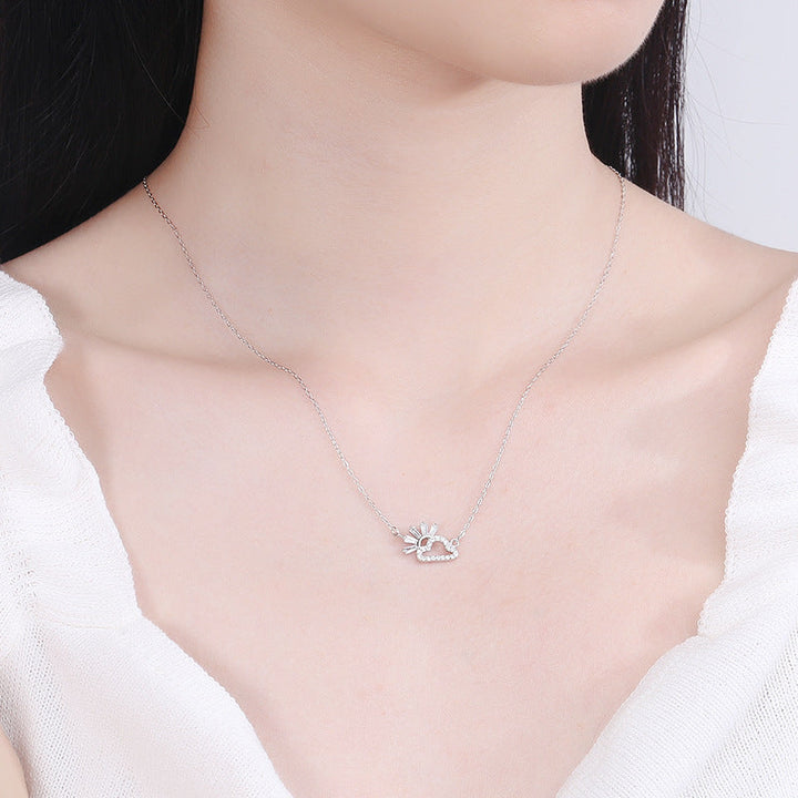 Women's necklace with playful cloud and sun pendant made of sparkling zircon Nin Boutique