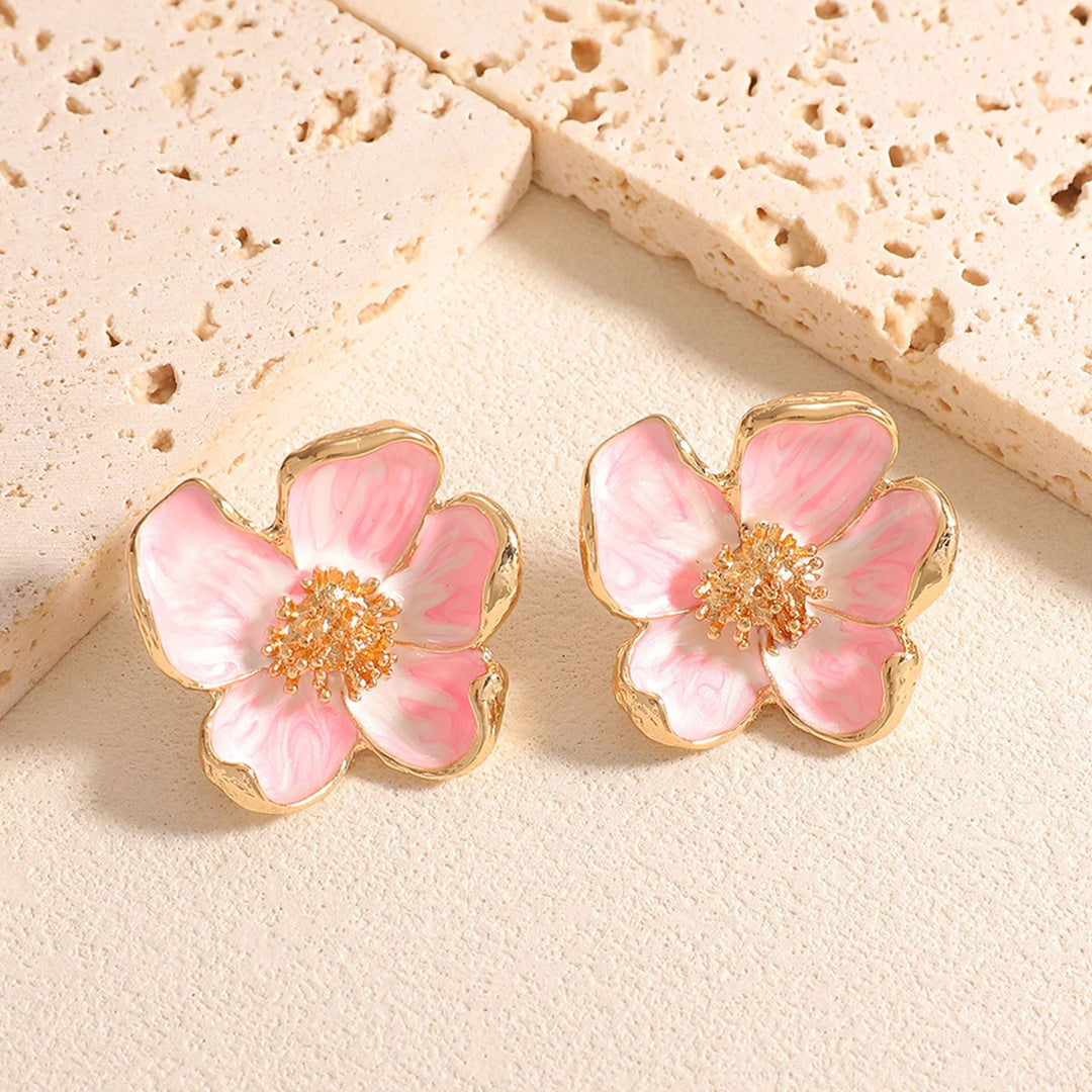 Ladies earrings in floral design with detailed accents Nin Boutique