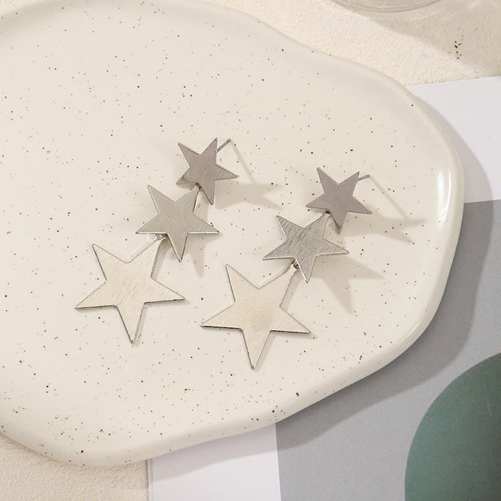 Ladies earrings in modern star design Nin Boutique