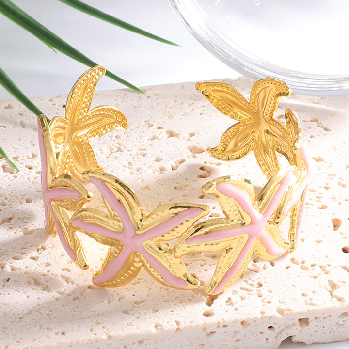Women's Open Bangle with Striking Star Motif Nin Boutique