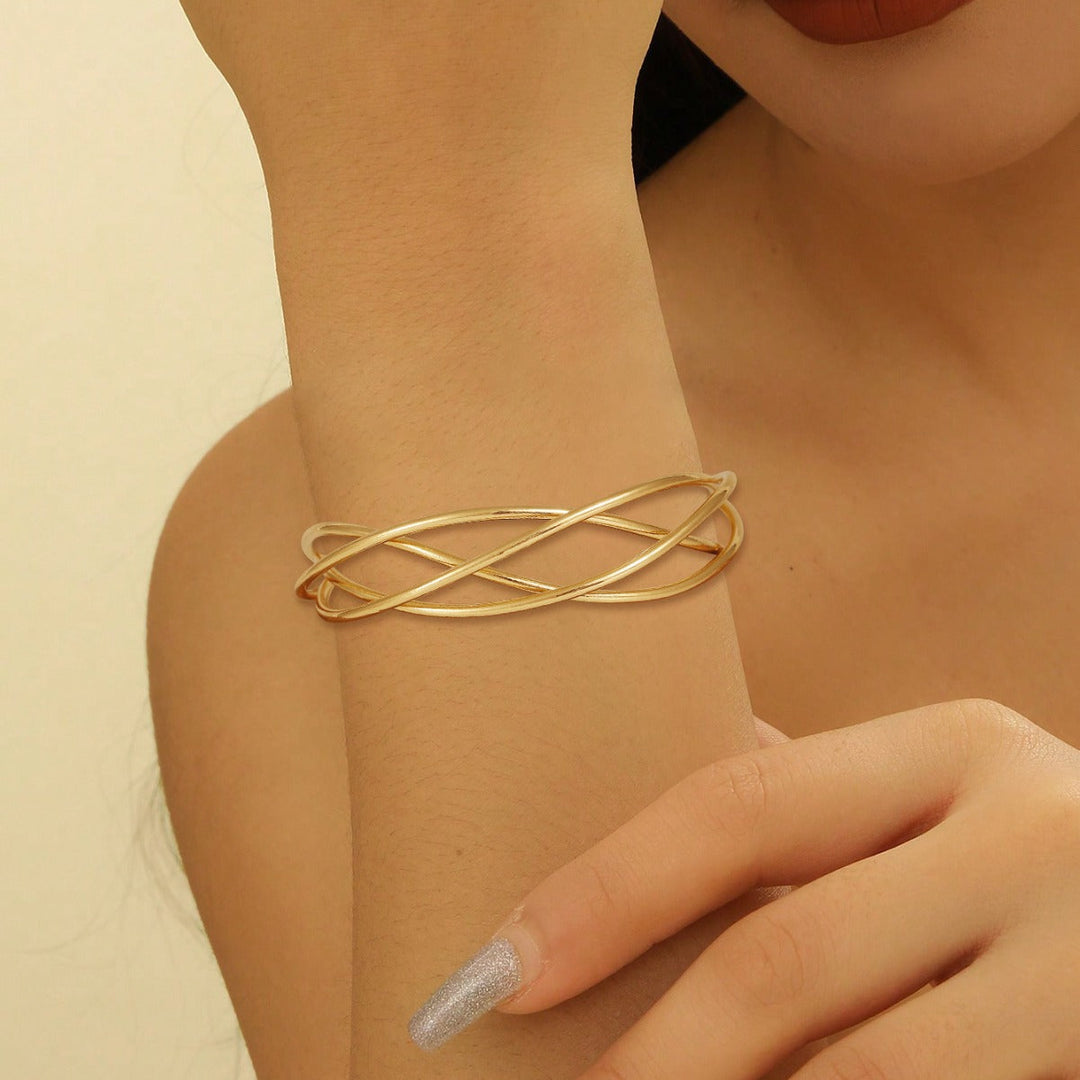 Women's bangle with elegant curved design Nin Boutique