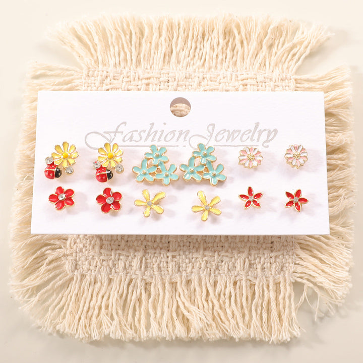 Ladies earring set with playful animal and mushroom design Nin Boutique