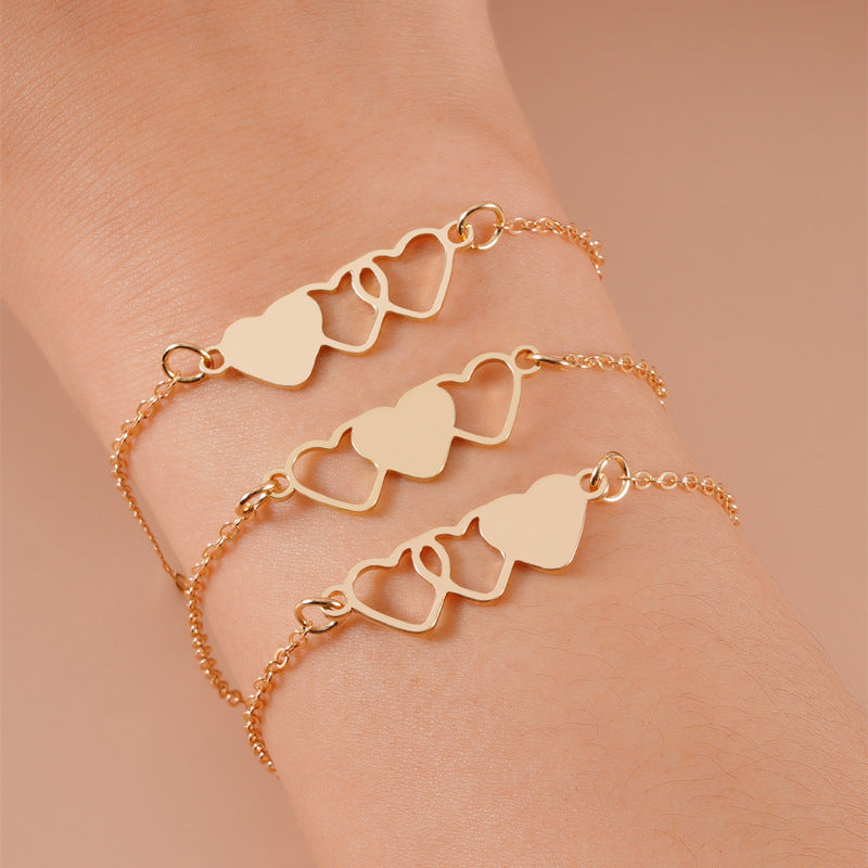 Women's anklet with playful heart motifs and delicate chain structure Nin Boutique