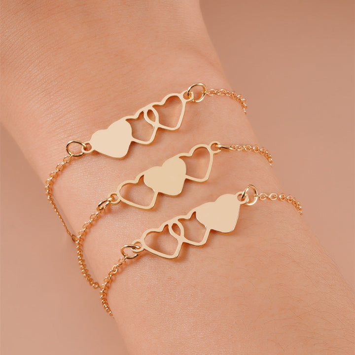 Women's anklet with playful heart motifs and delicate chain structure Nin Boutique