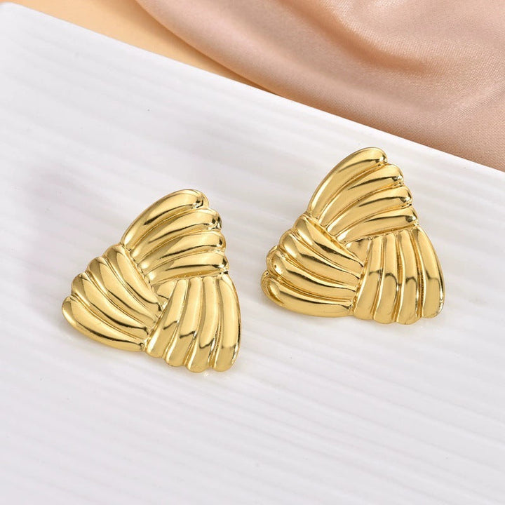 Women's earrings in sculptural wave design Nin Boutique