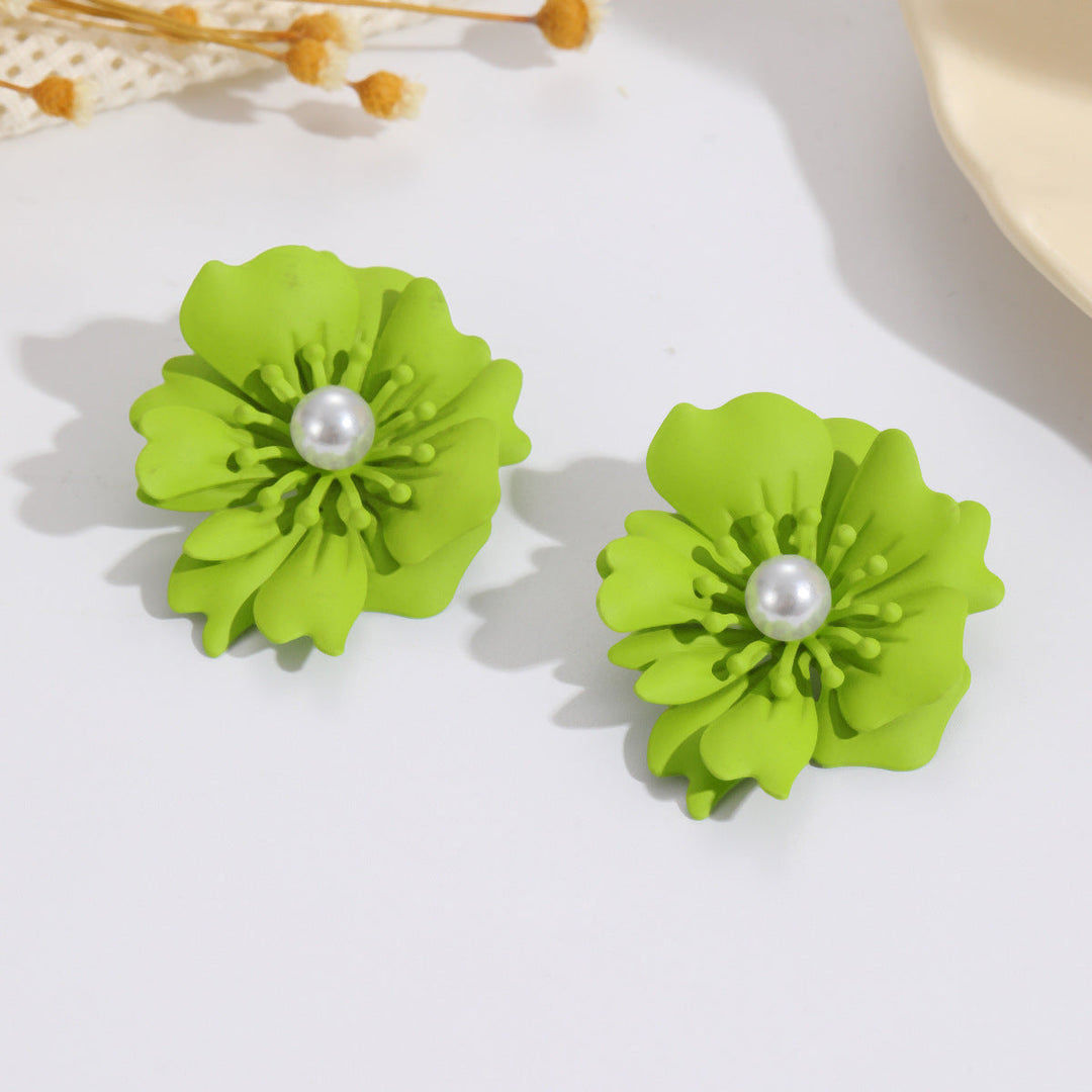Ladies earrings with elaborate floral pattern Nin Boutique
