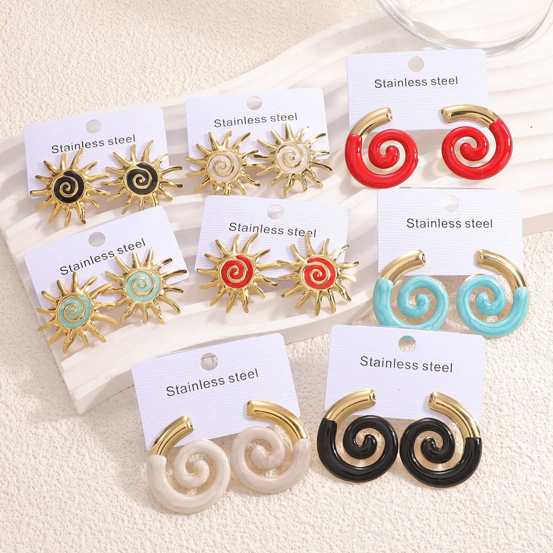Ladies earrings in artistic sun motif Nin Boutique