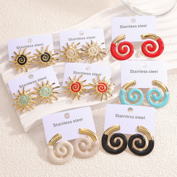 Ladies earrings in artistic sun motif Nin Boutique