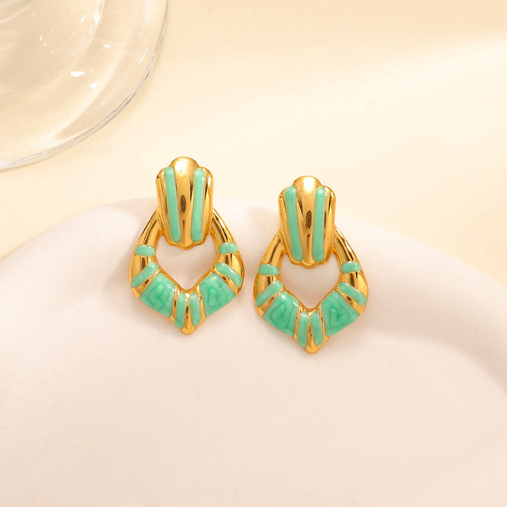 Ladies earrings in elegant shell design Nin Boutique